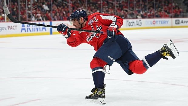 Washington Capitals forward Alex Ovechkin shoots the puck during a power play against the visiting Calgary Flames during the second period at Capital One Arena on February 25, 2025 in DC. 