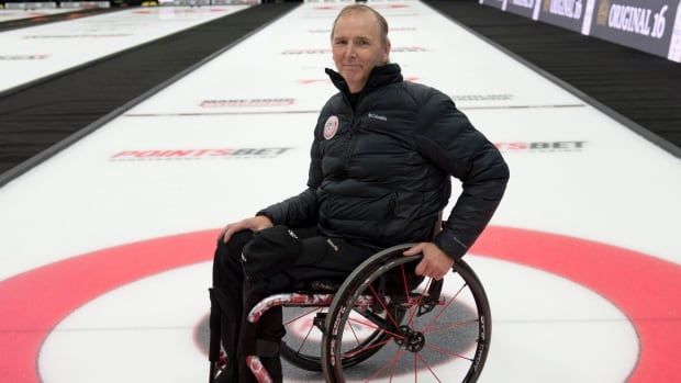 A male wheelchair curler is shown.