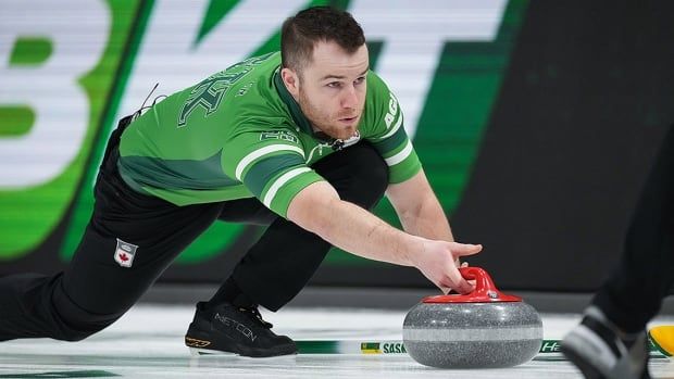 Saskatchewan skip Rylan Kleiter delivers a rock while playing Prince Edward Island during the Brier in Kelowna, B.C., on March 2, 2025. 