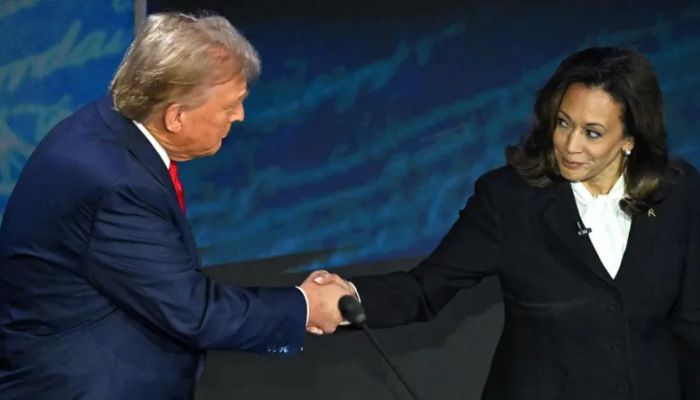 Trump and Harris shaking hands before the commencement of the debate