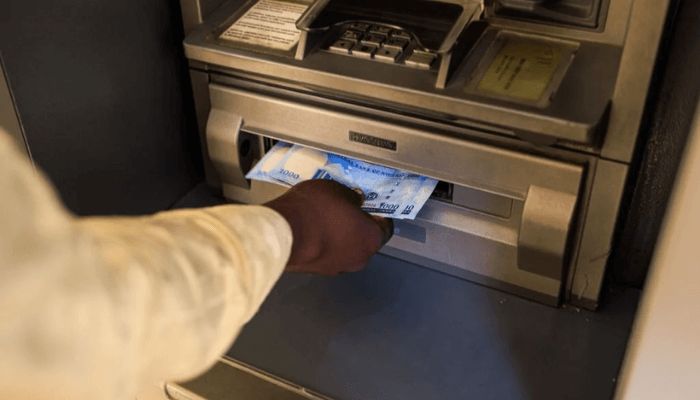 Fined banks load ATMs with cash after sanction