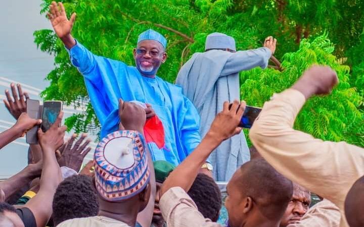 Governor Namadi waving to APC supporters during the campaign flag off in Hadejia