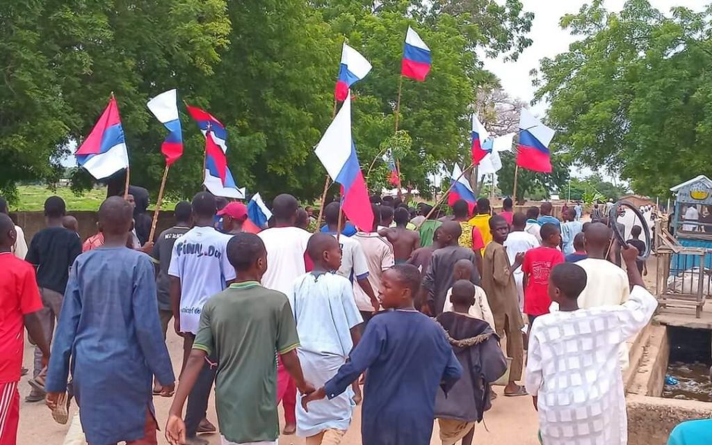 Protesters seen waving Russian flags