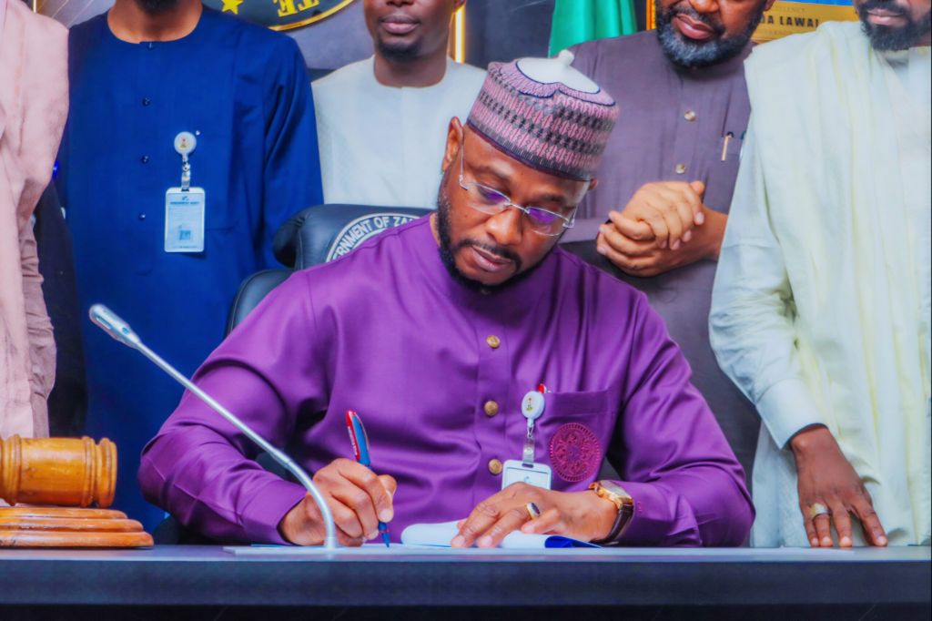 Governor Dauda Lawal signing the 2025 Zamfara budget bill into law