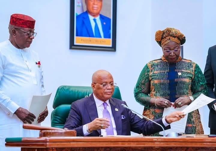 Governor Umo Eno of Akwa Ibom State signing the state's 2025 budget