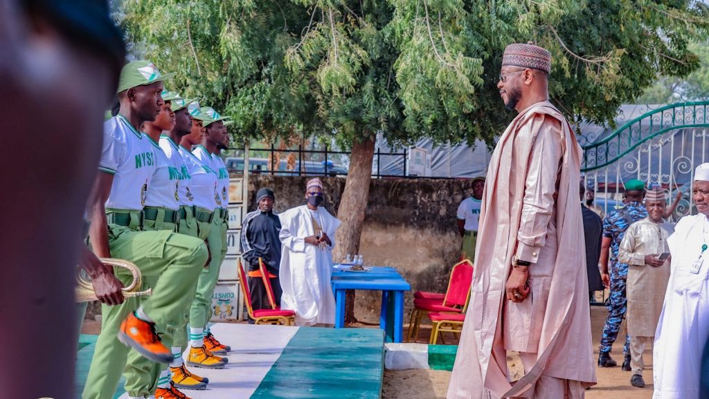 Governor Dauda Lawal inspecting a parade by corps members in Gusau on Friday