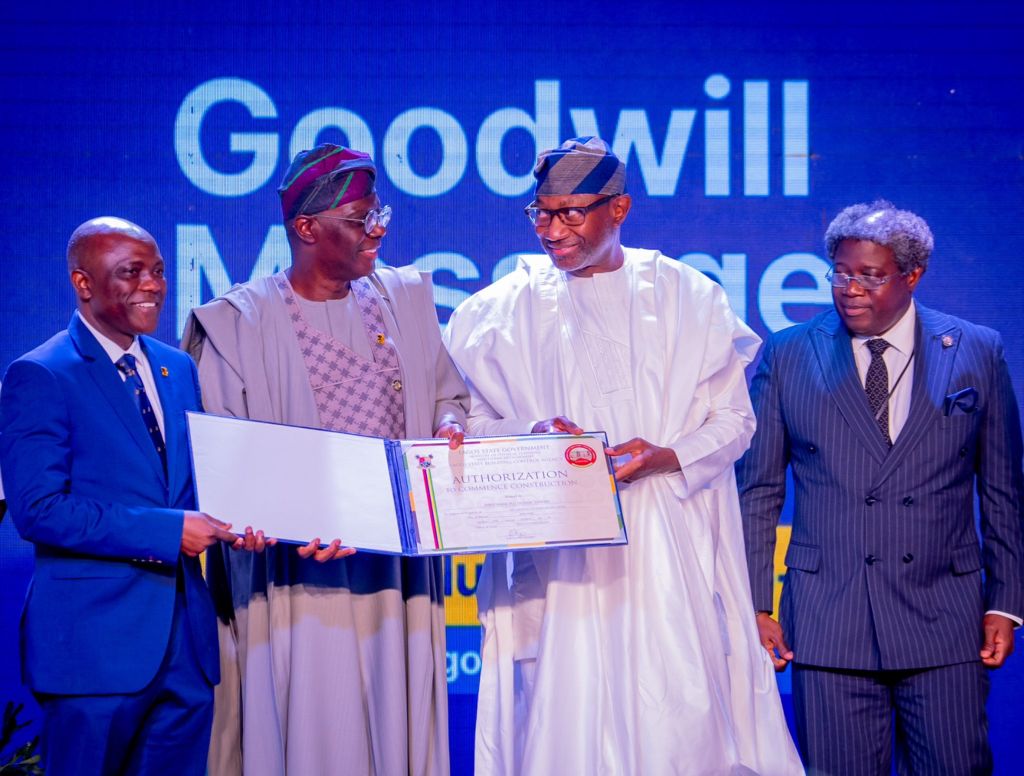 Governor of Lagos State, Babajide Sanwo-Olu, presenting a certificate of approval to FirstBank ahead of the construction of its eco-friendly headquarters