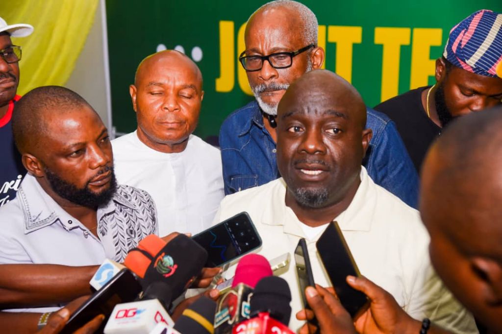 Mr Olopade speaking with journalists after the meeting