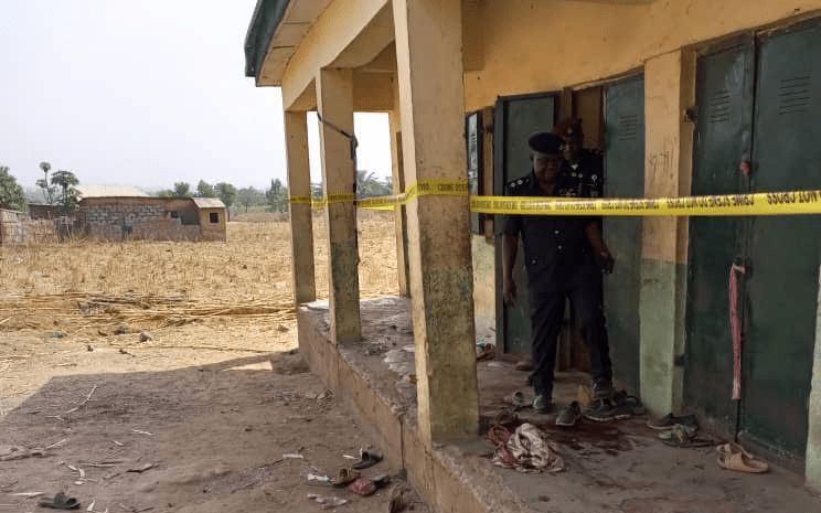 A blood-stained picture of the incident where students’ sandals are scattered around