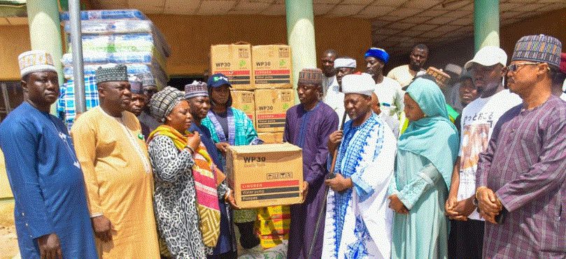 KWARA State government officials visit rice farms submerged by floods.