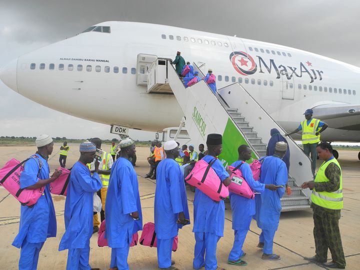 Hajj Pilgrims Boarding a plane