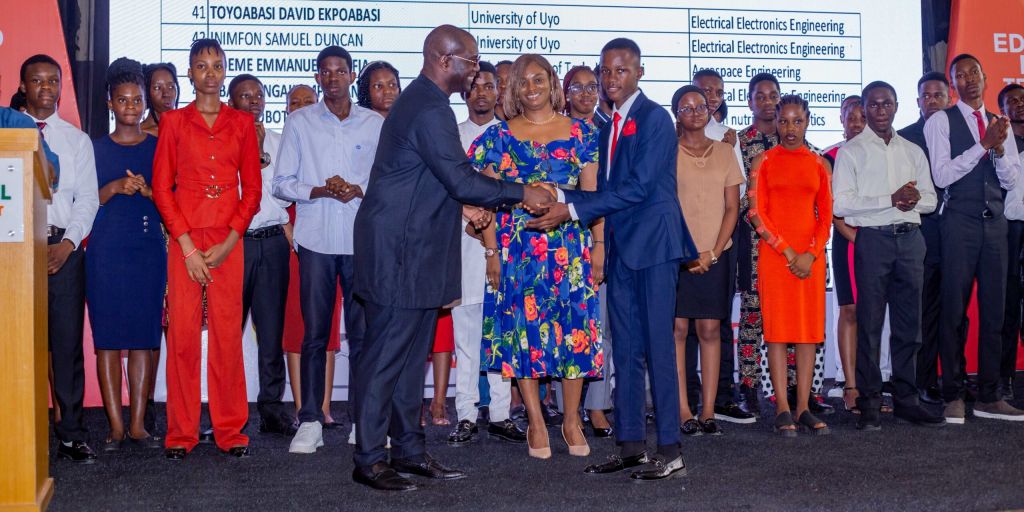 One of the scholarship beneficiaries in a handshake with MD of Savannah Energy, Nigeria, Pade Durotoye, at the Savannah Energy Education and Internship Training Programme in Uyo