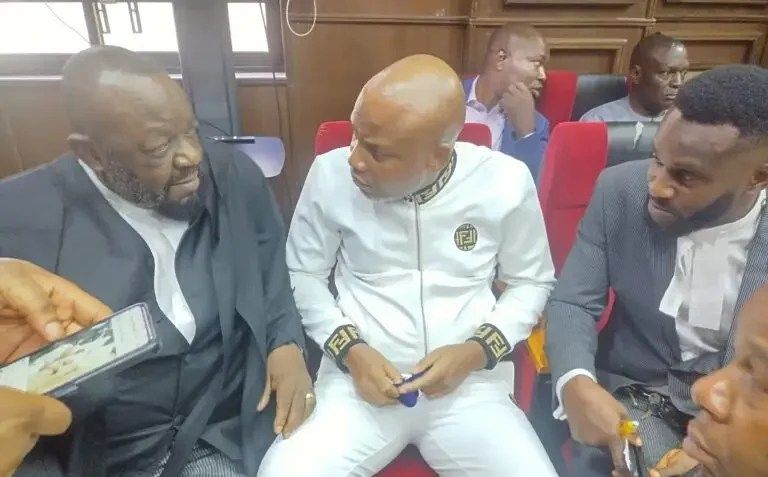 IPOB leader, Nnamdi Kanu, with his lawyers in court on Monday.