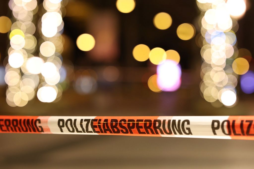 21 December 2024, Saxony-Anhalt, Magdeburg: A police cordon seals off the crime scene at the Christmas market in Magdeburg. Almost eight years to the day after the terrorist attack on the Berlin Christmas market at the Memorial Church, a man drives into a crowd of people in Magdeburg. (PHOTO CREDIT: Matthias Bein/dpa)