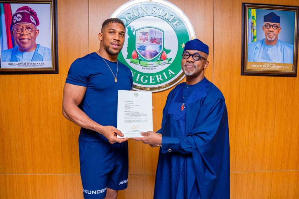 Anthony Joshua receiving his letter of appointment