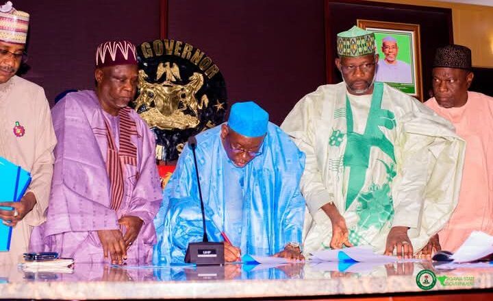 Jigawa State Governor, Umar Namadi, signing the budget