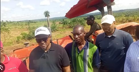 Cross River’s Commissioner for Agriculture, Johnson Ebokpo and other state officials inspecting ongoing land preparation for the cultivation of maize in Odukpani LGA