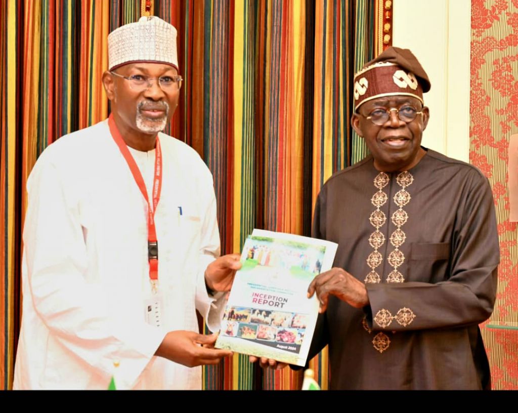 Prof. Attahiru Jega, Chairman, Presidential Committee on Implementation of Livestock Reforms, presenting the committee’s report to President Bola Tinubu at the Presidential Villa on Thursday