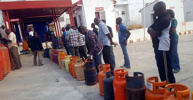 A cooking gas depot with customers in queue to refill their cylinders. [Punch]