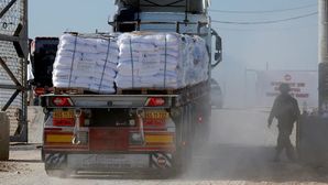 First aid trucks enter Gaza from Egypt as ceasefire takes effect