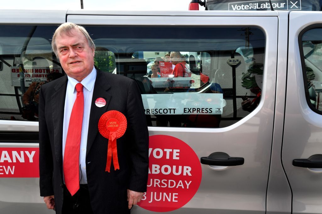 John Prescott returns to his minibus displaying a sign reading 'Prescott Express' after giving a stump speech during the 2017 general election campaign.