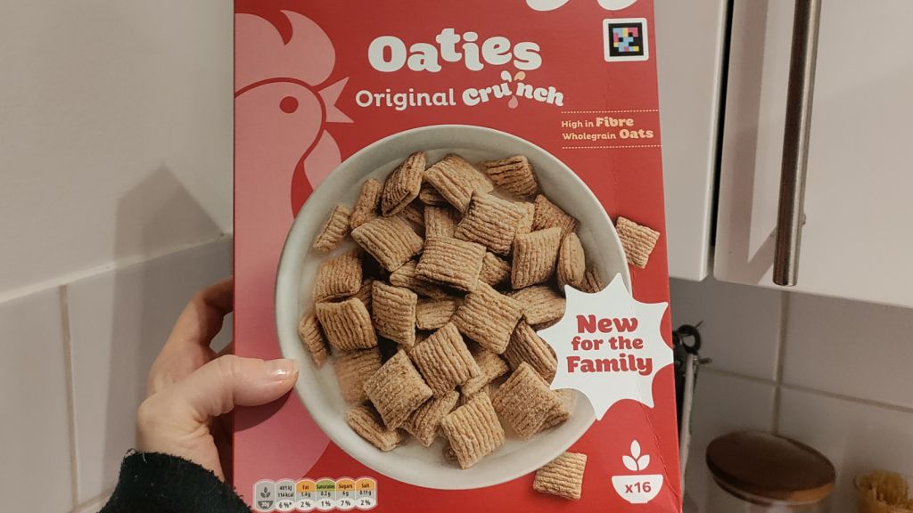 Writer holding a box of original Oaties from Kellogg's