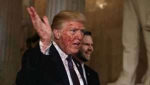 Donald Trump covered in blood with JD Vance