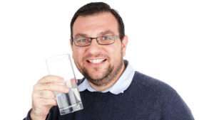 Man with glass of water