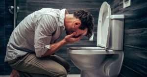 Man worshipping Saint Porcelain the morning after St Patrick's Day