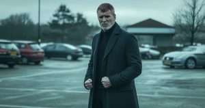 Roy Keane stood angrily in a car park