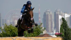 Doug Payne and Vandiver, pictured at the Tokyo Olympics.