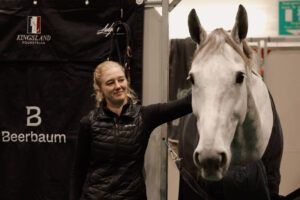 Christian Kukuk's groom Sofie Karlsson with Checker 47.