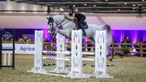 Showjumping training tips at the LeMieux masterclass at London International. Tabitha Kyle jumps a fence on Morginto during the masterclass