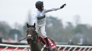 Nico de Boinville salutes the crowd after winning the Ladbrokes Christmas Hurdle on Constitution Hill on Boxing Day at Kempton.