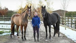 Emma Thomas, who has benefited from help from the Performance Mentoring Programme, with her top horses, Icarus and The Buzz Factor.