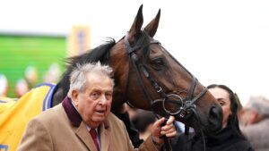 John Hales, pictured with Prokektorat after winning the Ryanair Chase at Cheltenham Festival 2024.