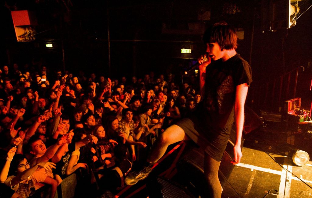 Alice Glass of Crystal Castles performing to an audience of cheering fans at Heaven nightclub London.