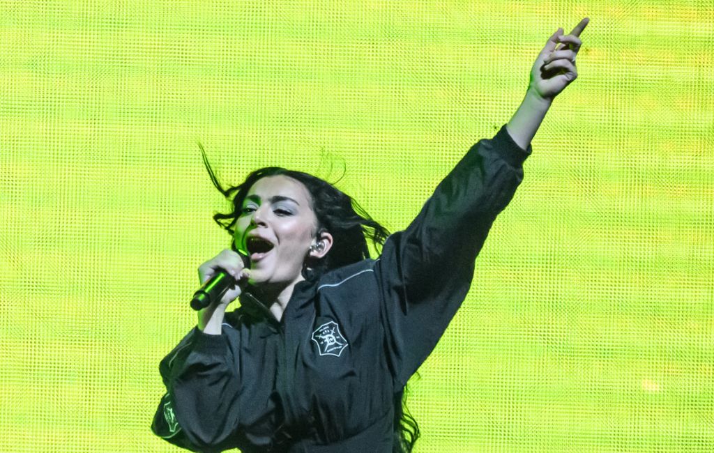 Charli XCX performing live on stage