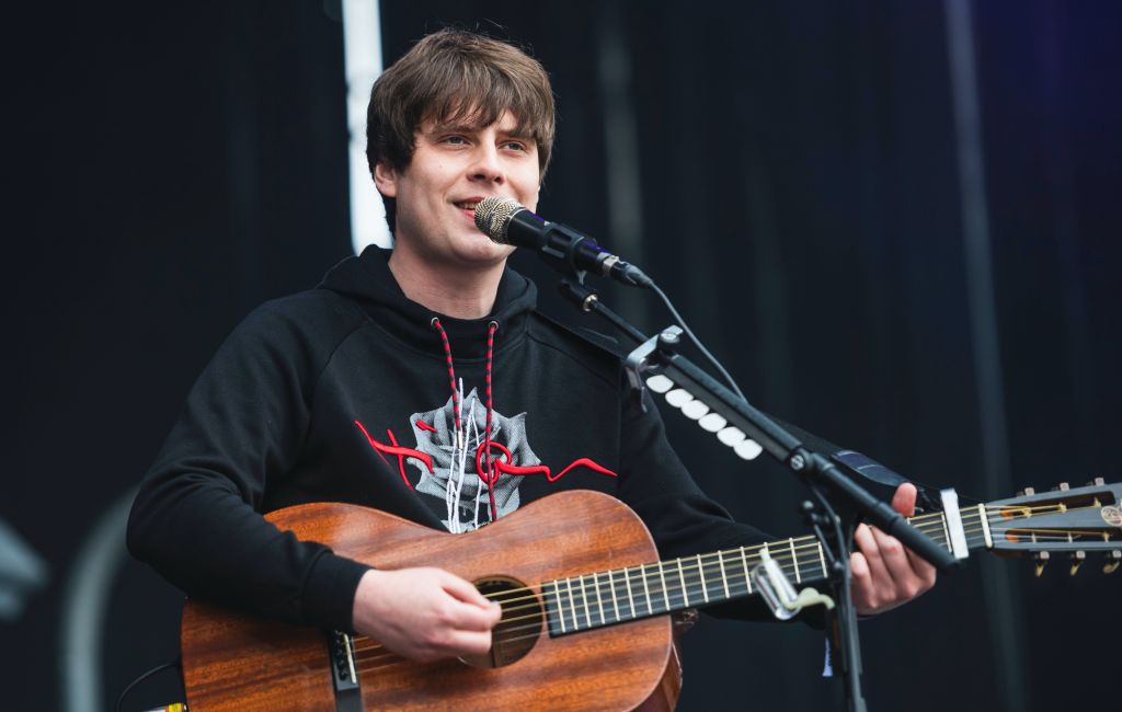 Jake Bugg performing live on stage