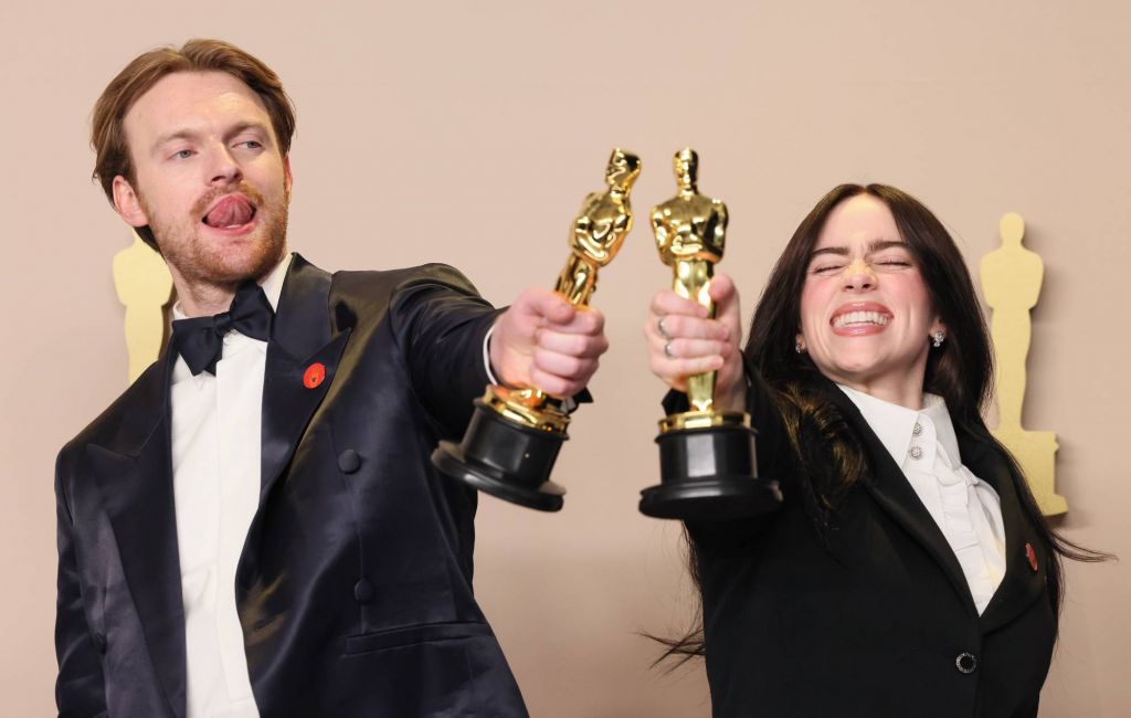 Finneas O'Connell and Billie Eilish pose in the press room during the 96th Annual Academy Awards at Ovation Hollywood on March 10, 2024 in Hollywood, California. (Photo by Rodin Eckenroth/Getty Images)