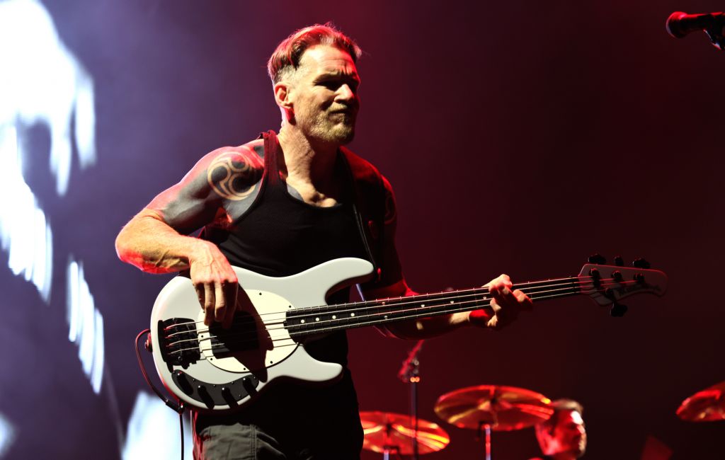 Tim Commerford of Rage Against The Machine performing live on stage