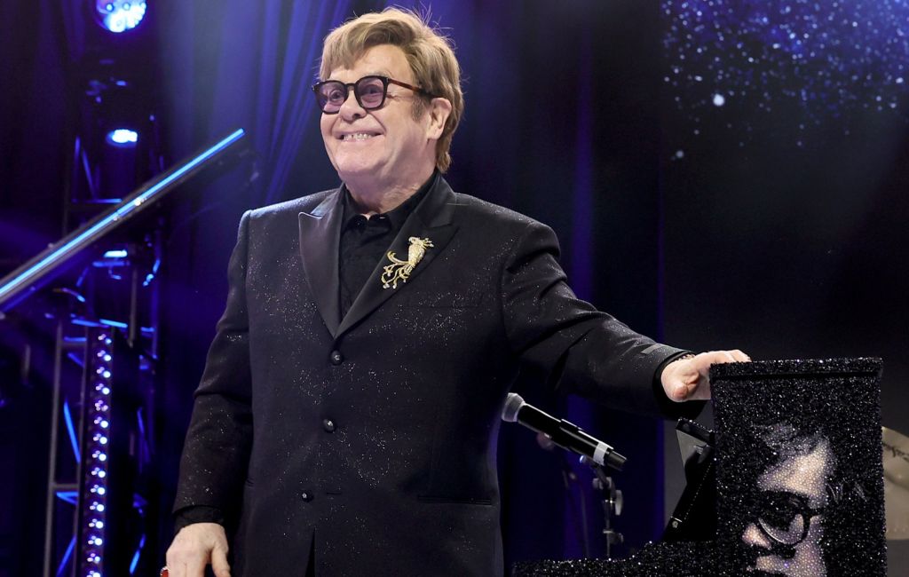 Elton John performing live on stage