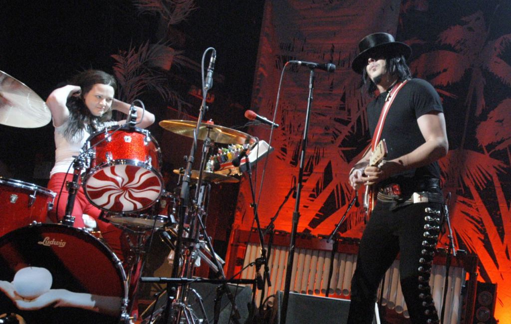 The White Stripes' Meg and Jack White performing on stage (Photo by Ross Gilmore/Redferns)