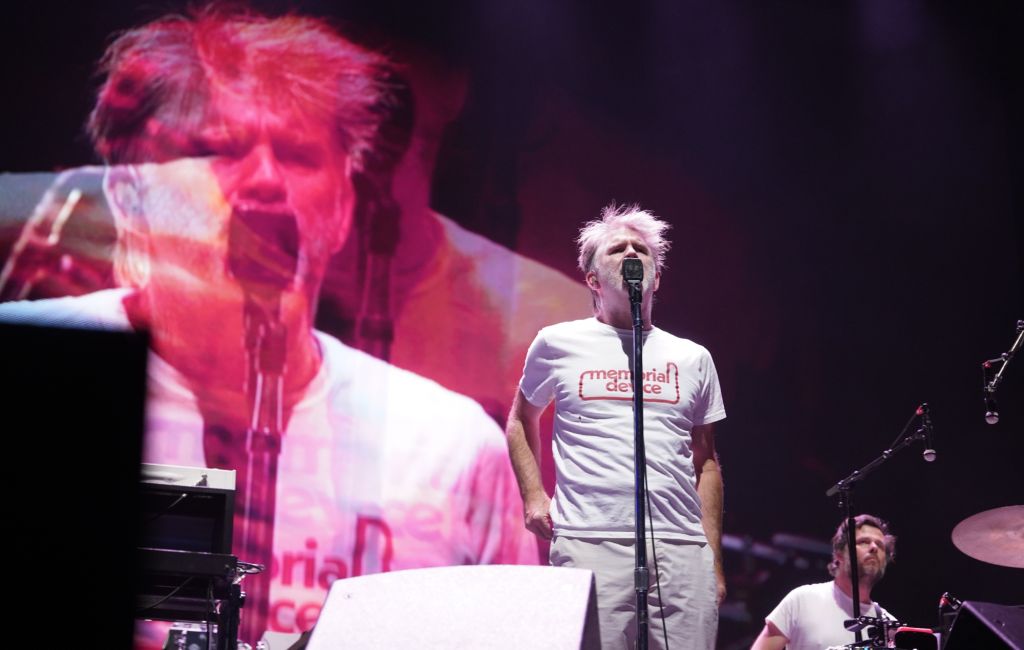 James Murphy performing live on stage with LCD Soundsystem