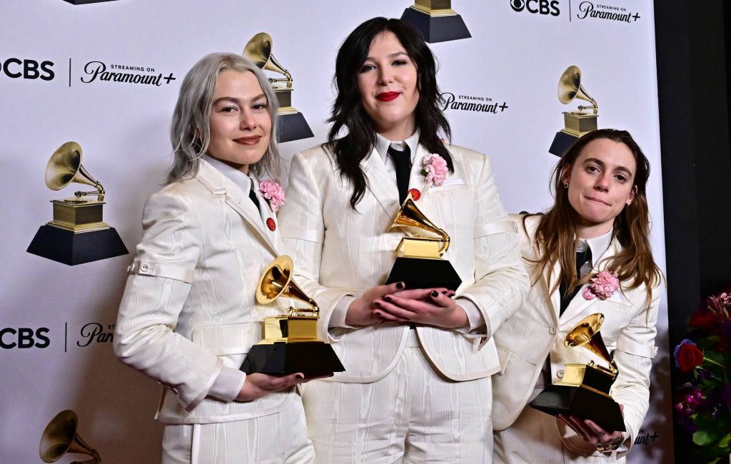 Julien Baker, Phoebe Bridgers and Lucy Dacus of boygenius pose in the press room at the 66th Annual Grammy Awards. (Photo by FREDERIC J. BROWN/AFP via Getty Images)