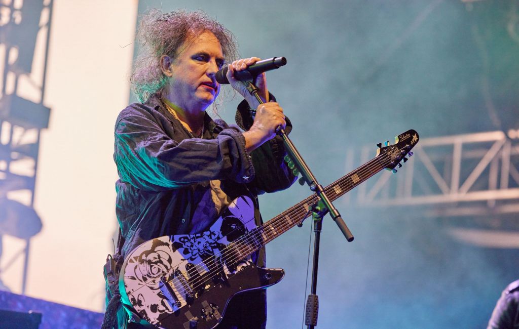 Robert Smith of The Cure performs live