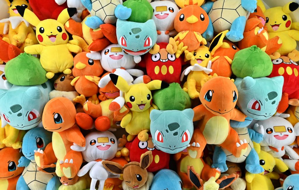 A stack of Pokémon soft toys.