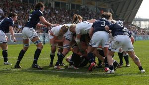 Scotland and England players in a maul