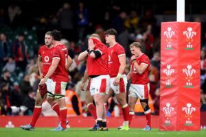 Wales Keiron Assiratti buries his head in his shirt after losing to Australia in November 2024.