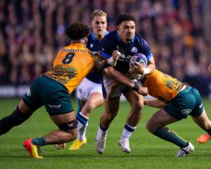 Scotland’s Sione Tuipulotu tries to make it past two Australian tacklers in the October 2022 international